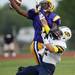 Ypsilanti defensive back Jacob Simmons disrupts a pass intended for Saline running back Gage Hammond. The Saline Hornets defeated Ypsilanti 49-14. Daniel Brenner I AnnArbor.com